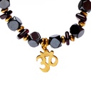 Bracelet Hémétite / Grenat facetté avec Om élastiqué 0