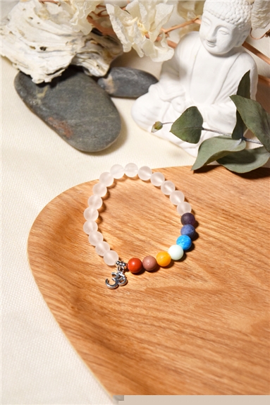 Bracelet 7 Chakras Cristal de Roche Perles rondes 8 mm Breloque Om