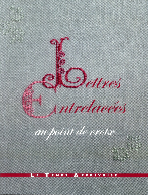 Lettres entrelacées au point de croix