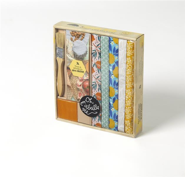 Faire ses emballages réutilisables à base de cire d'abeille - Ce coffret contient : 5 tissus de 25 x 25 cm, 1 pinceau, 4 barres de cire et 1 livre d'astuces pour se mettre au zéro déchet